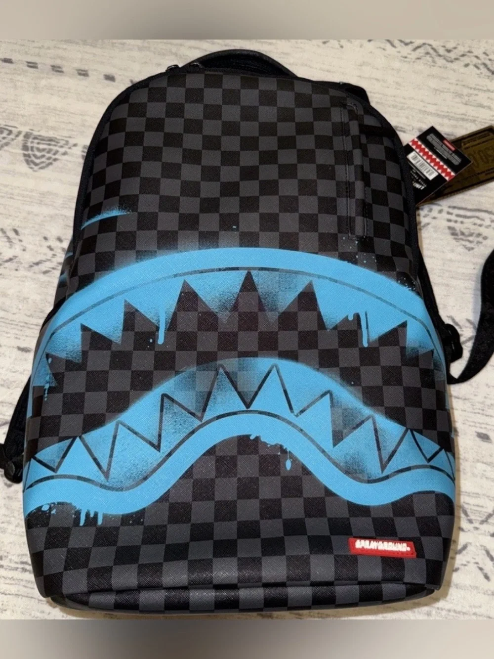 Gamma teal check spray ground backpack. 🦈